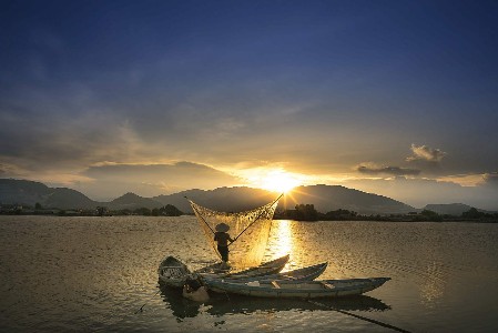Fischer im Mekong Fluss